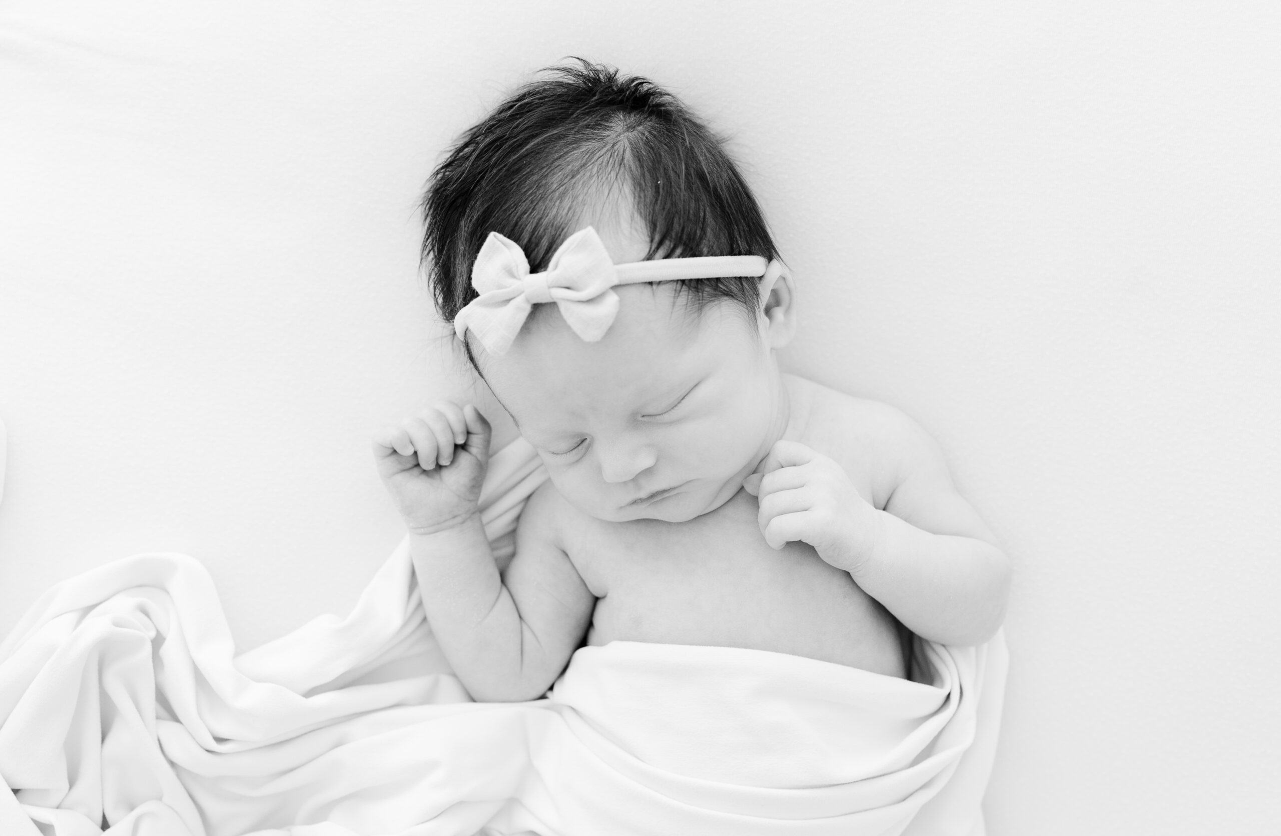 ampa newborn photographer sharing the honest differences between studio and in-home sessions and why studio photography creates timeless, stress-free results.